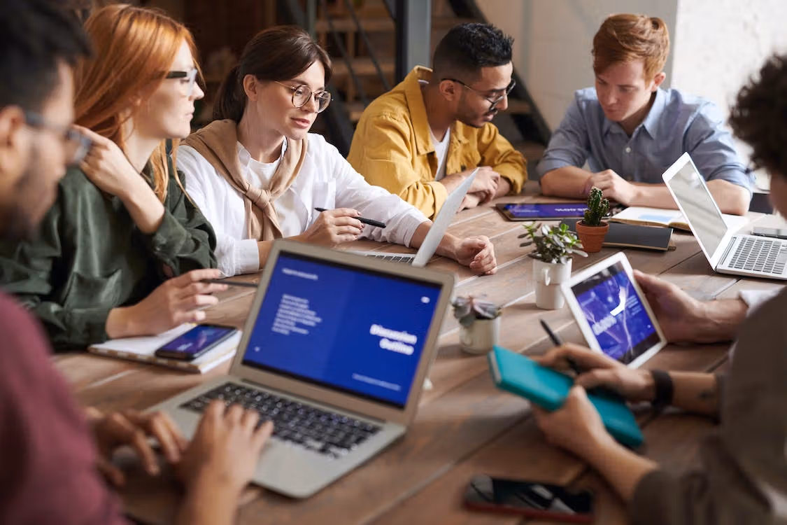 A team listening to a transcripted audio