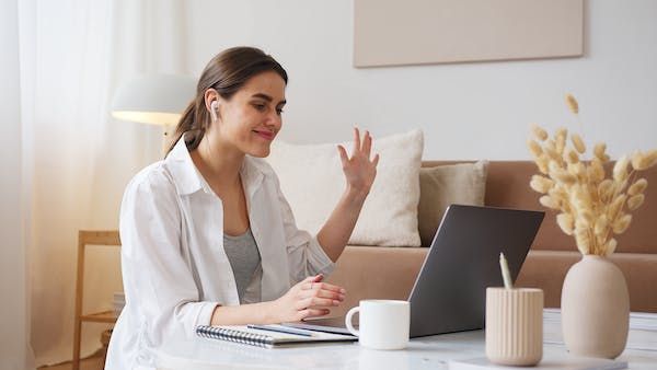 A woman with a disability learning with sign language