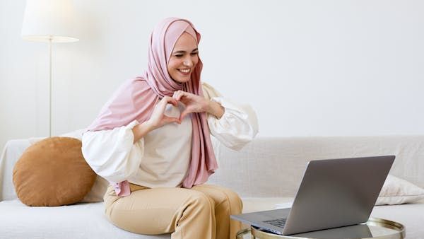 A woman using sign language to teach translation