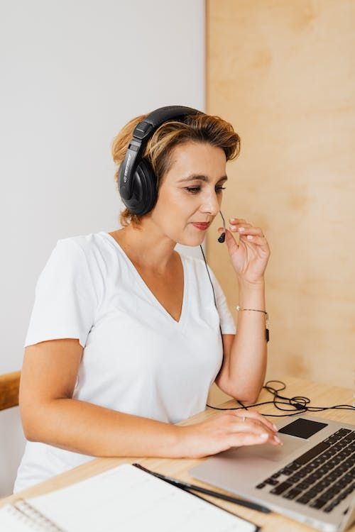 Woman creating transcriptions manually