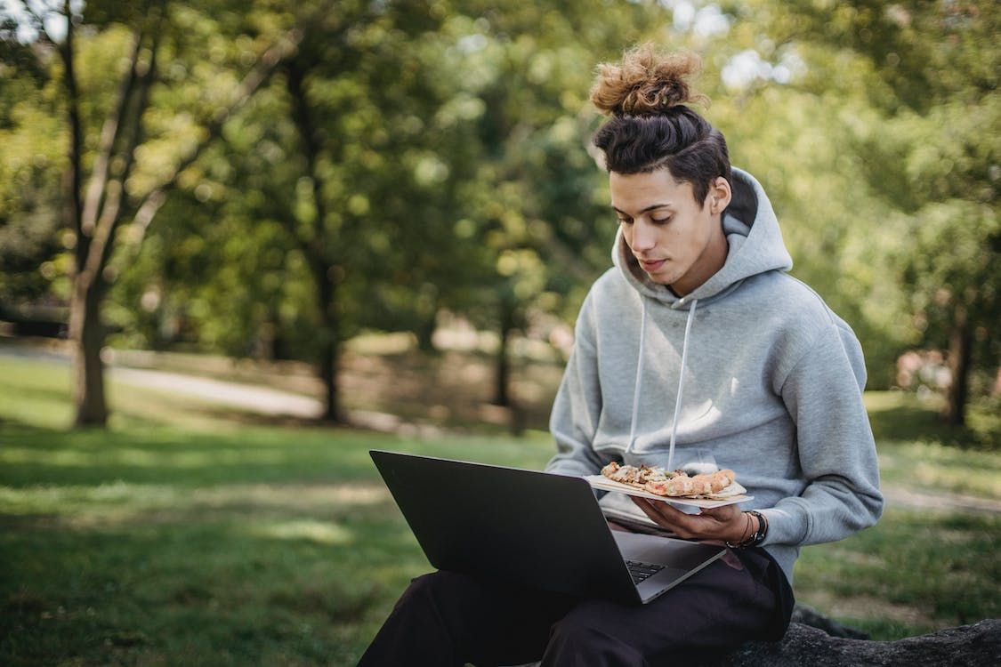 A man manually translating online lesson with Happy Scribe