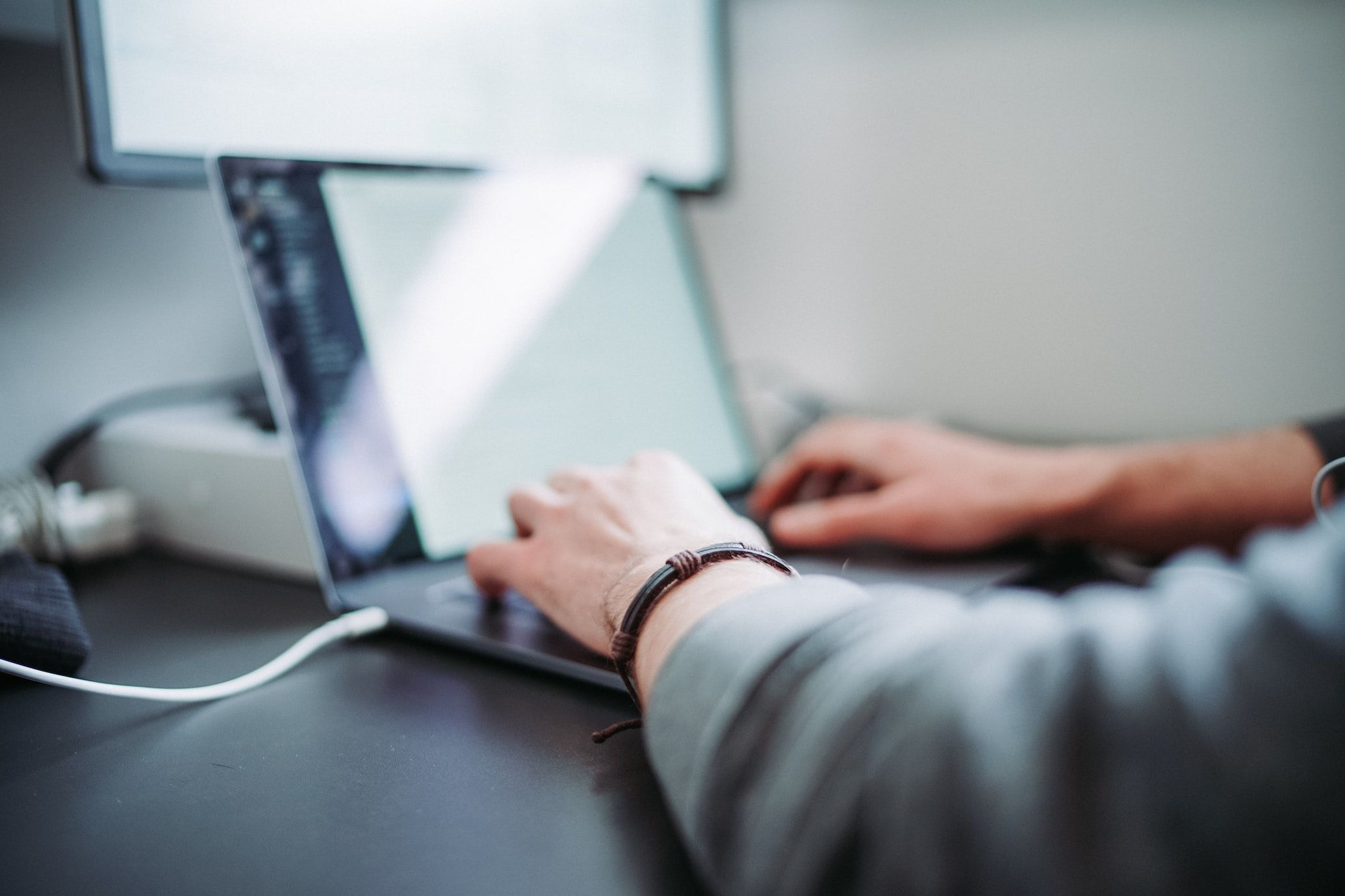 man working on some captions for a video shoot